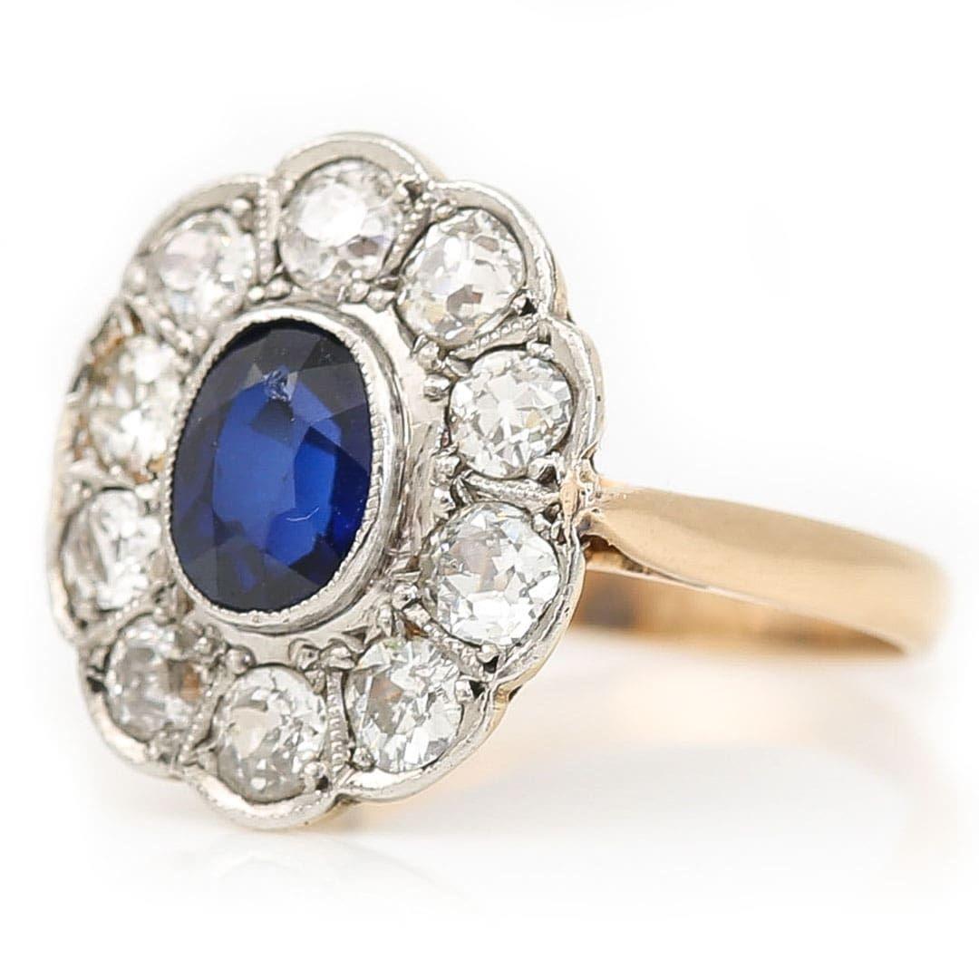 Oval Cut Edwardian 18ct Gold 1ct Sapphire and 1ct Diamond Cluster Ring, Circa 1910 For Sale