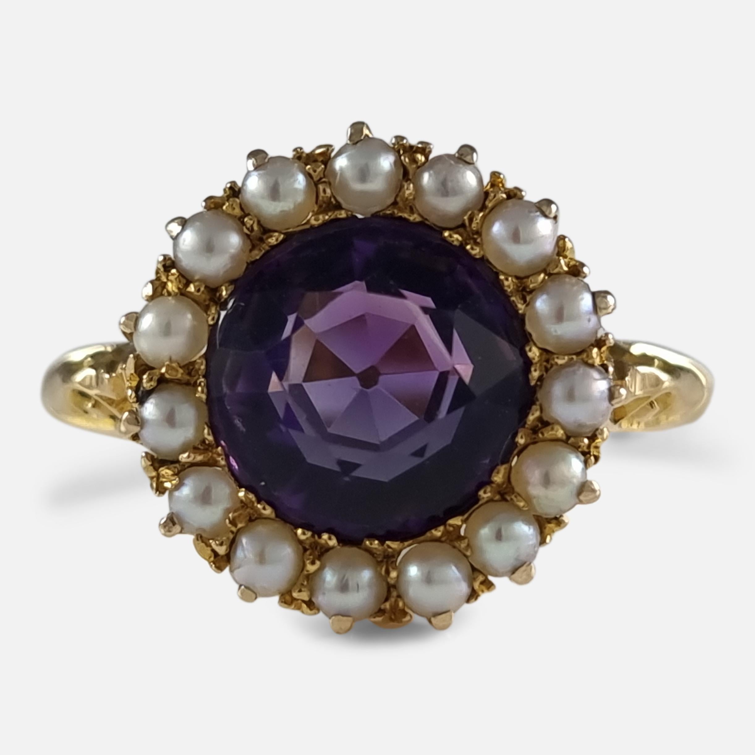 An Edwardian 18ct yellow gold amethyst and seed pearl cluster ring. The ring is set with a central faceted amethyst, surrounded by a further fifteen seed pearls, all within a cluster formation.

The ring is hallmarked with Birmingham assay marks,