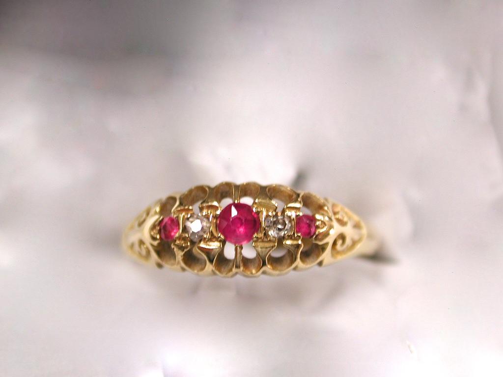 Edwardian 18ct Gold Ruby & Diamond Ring, dated 1908, Birmingham
Nice range of old cut rubies and diamonds.