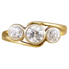 Edwardian 18ct Yellow and White Gold Diamond Three Stone Twist Ring