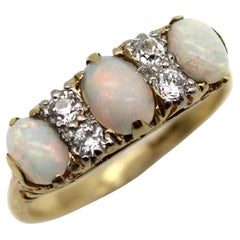 Edwardian 18K Gold Opal and Diamond Three-Stone Ring