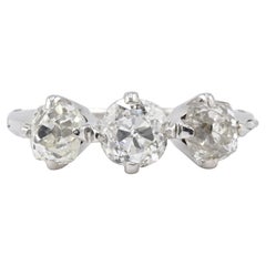 Edwardian 18K White Gold 3-Stone Diamond Ring 1.87 Carats Old Mine Cuts