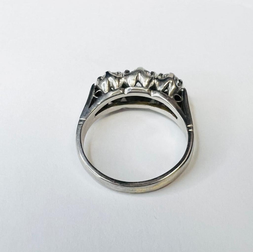 Presenting a,

An Edwardian Ring with prong set Diamonds in antique setting.

The Diamonds are natural and earth mined approximately 1CTW

The Ring is 6mm wide, 7mm Rise and 2mm shank

Weight 4.78g

Marked 18K

Ships in a jewelry gift box. 