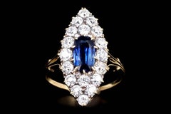 Edwardian 18K Yellow Gold 1.25 Carat Ceylon Blue Sapphire Diamond Navette Ring