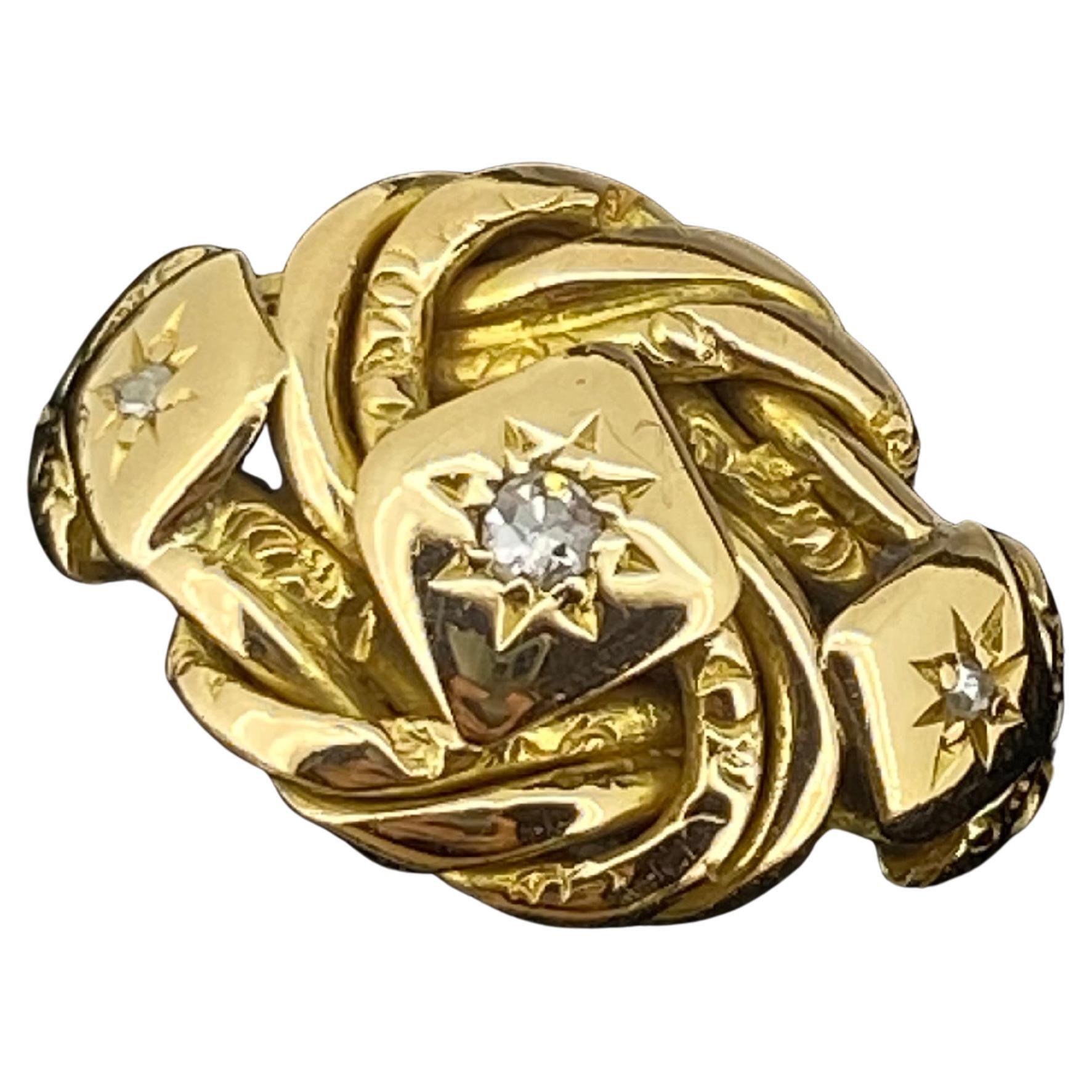 Anello edoardiano in oro giallo 18 carati e diamanti con motivo "nodo", H. H. in vendita