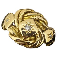 Anello edoardiano in oro giallo 18 carati e diamanti con motivo "nodo", H. H.