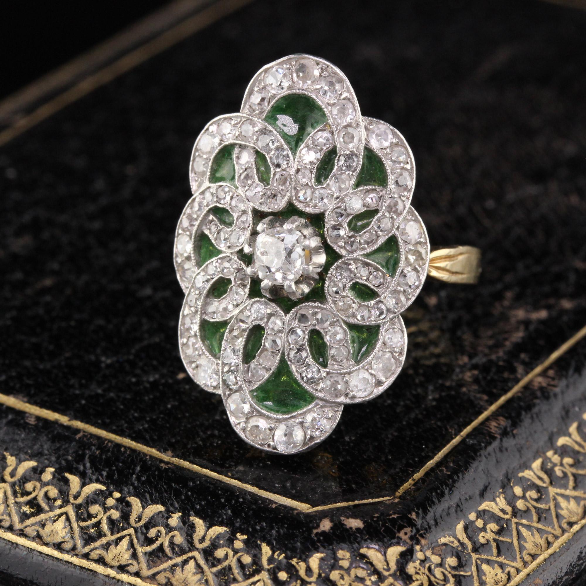 Magnificent Edwardian Shield Ring with an Old Mine Cut Diamond Center, beautiful green plique a jour enamel, and a gorgeous motif. Excellent finger coverage. Can be worn as an engagement ring or cocktail ring. So unique!

#R0240

Metal: 18K Yellow