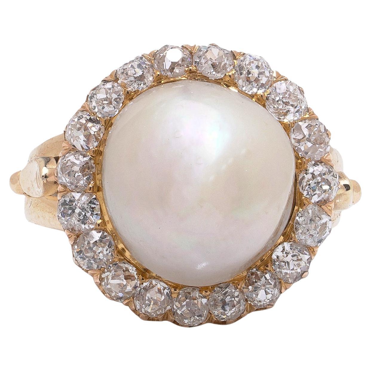 Bague édouardienne en or 18KT avec perles naturelles et diamants, vers 1910