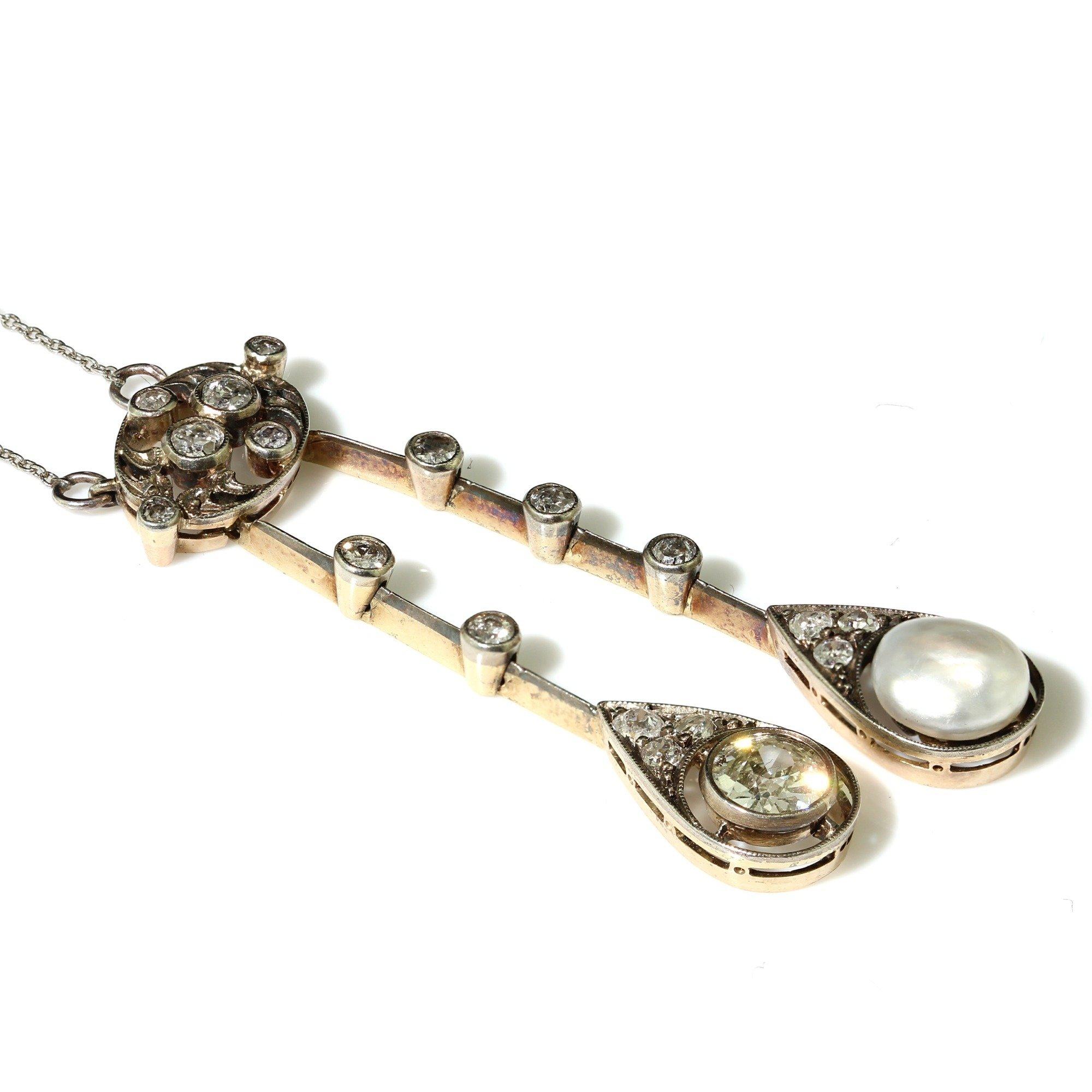 Women's Edwardian 18kt gold necklace, featuring a stunning diamond and pearl pendant.  For Sale
