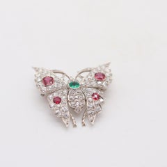 EDWARDIAN 1900 Favolosa farfalla in oro 18Kt con diamanti, rubini e smeraldo