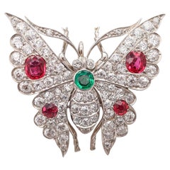 EDWARDIAN 1900 Favolosa farfalla in oro 18Kt con diamanti, rubini e smeraldo