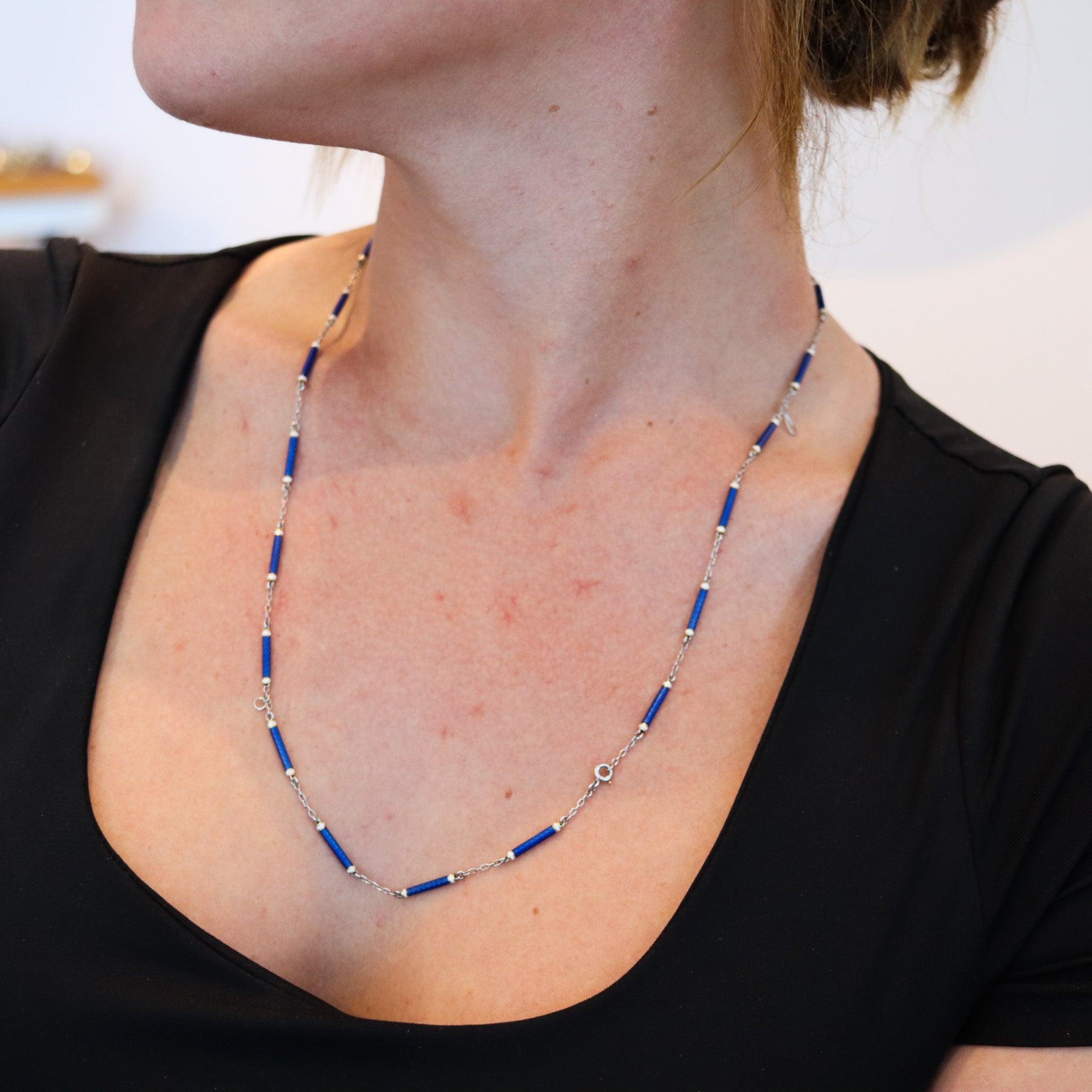 French Edwardian enameled chain.

This fantastic necklace chain, was created in Paris France during the early Edwardian period, back in the 1900. The beautiful chain has been carefully crafted in solid platinum with high polished finish and is