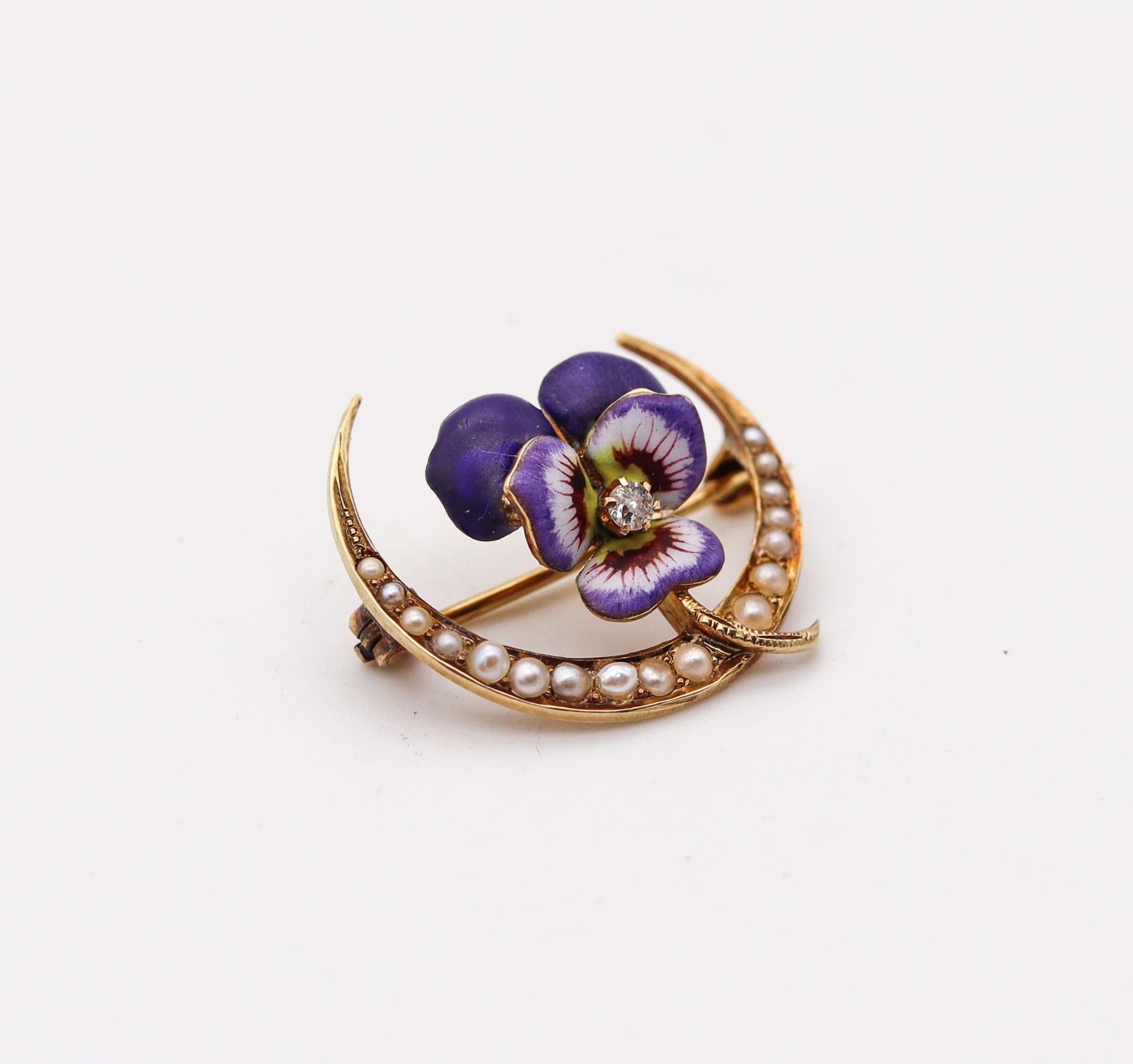 Edwardian Enameled Pansy flower pin.

Beautiful piece, created in America during the Edwardian and the Art Nouveau periods back in the 1900-1910. This beautiful pin brooch has been carefully crafted in the shape of a pansy flower with a half moon in