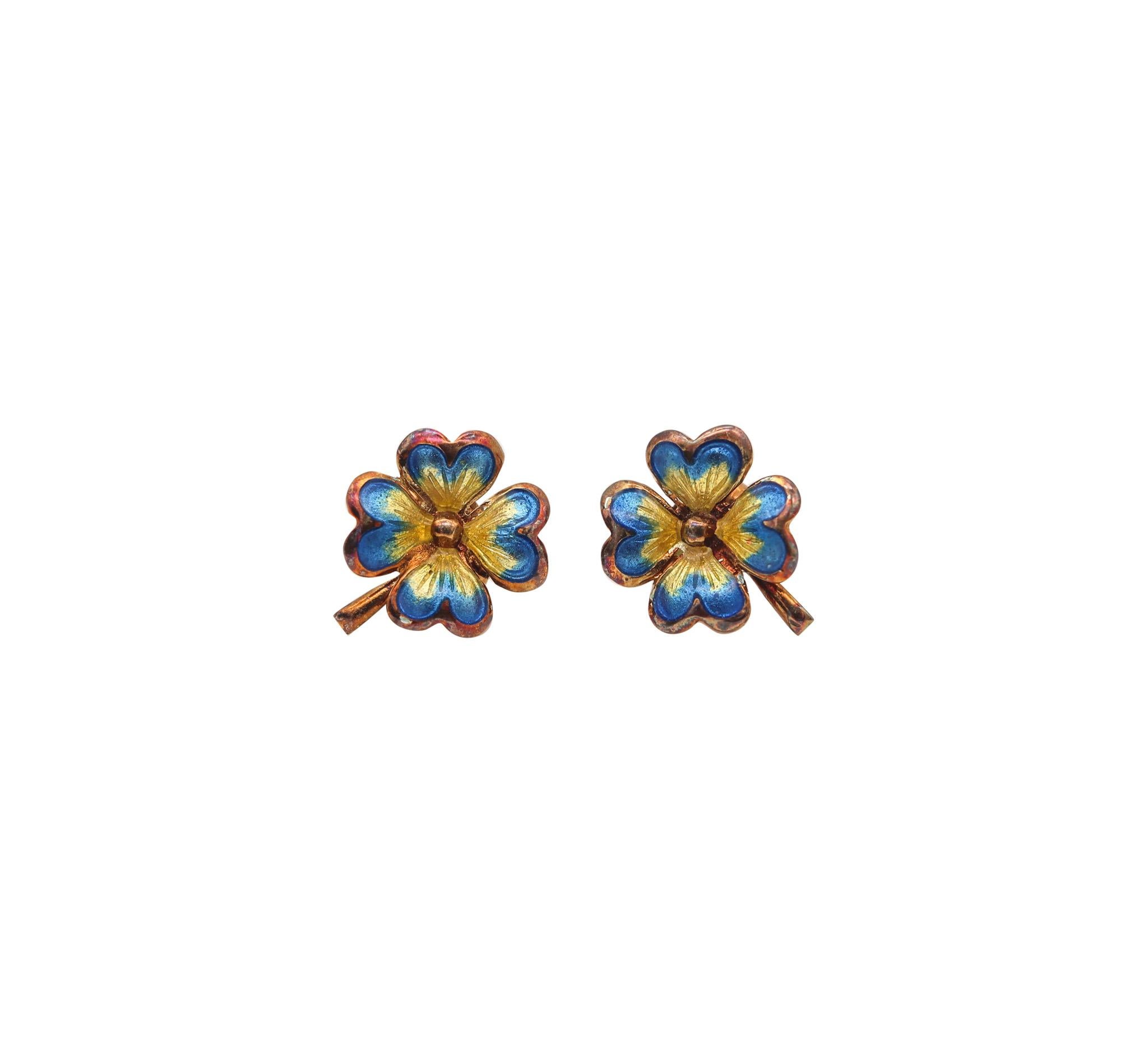 Art nouveau enameled flower pendant and earrings.

Beautiful and colorful set composed by a pair of stud earrings and a pendant, created in America during the Edwardian and the Art Nouveau periods, back in the 1905. This set has been carefully