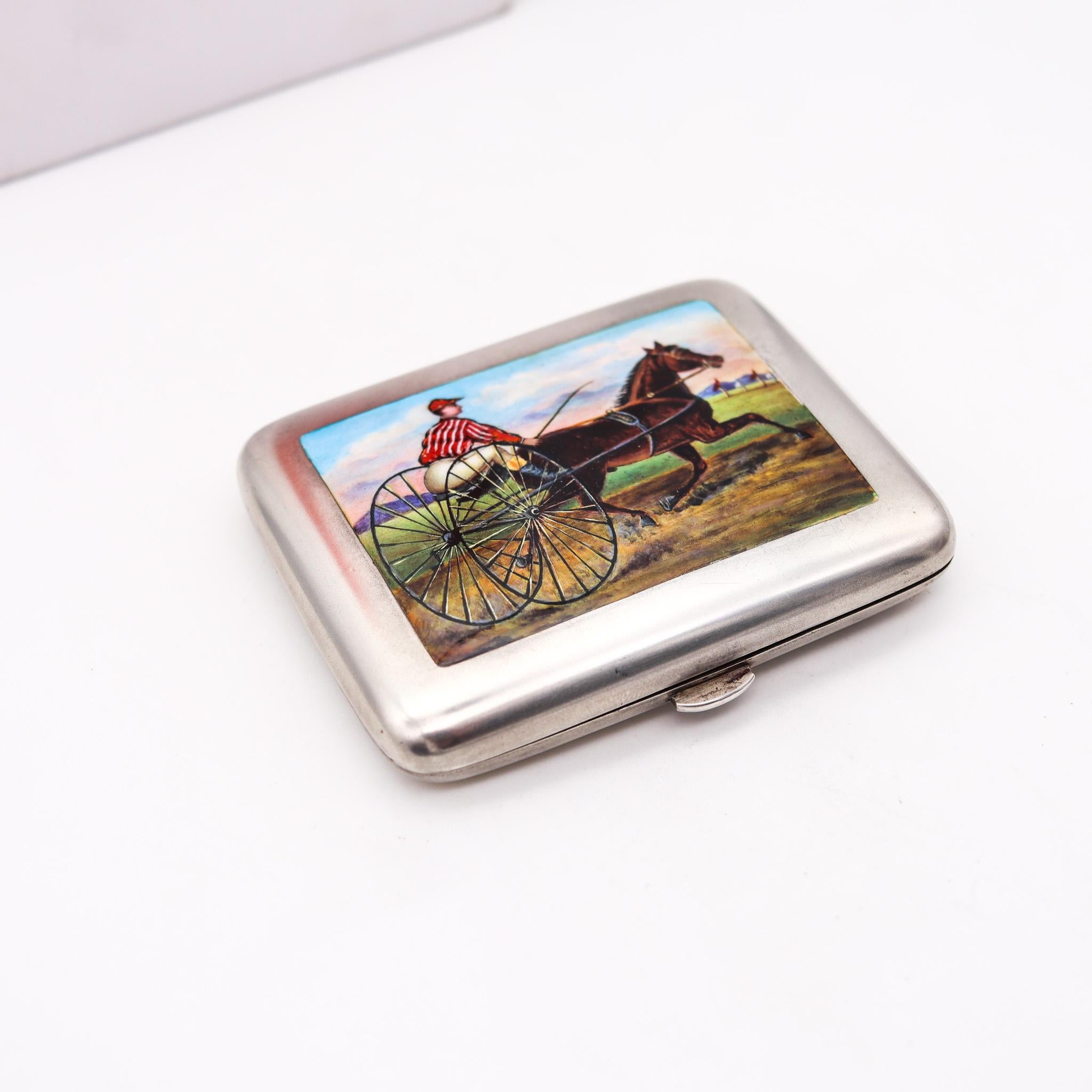 Enamelled German cigarette case.

Great historical piece, created in Germany during the turn of the century, back in the 1905. This beautiful cigarette box has been carefully crafted in the shape of a slightly cushioned rectangular form with