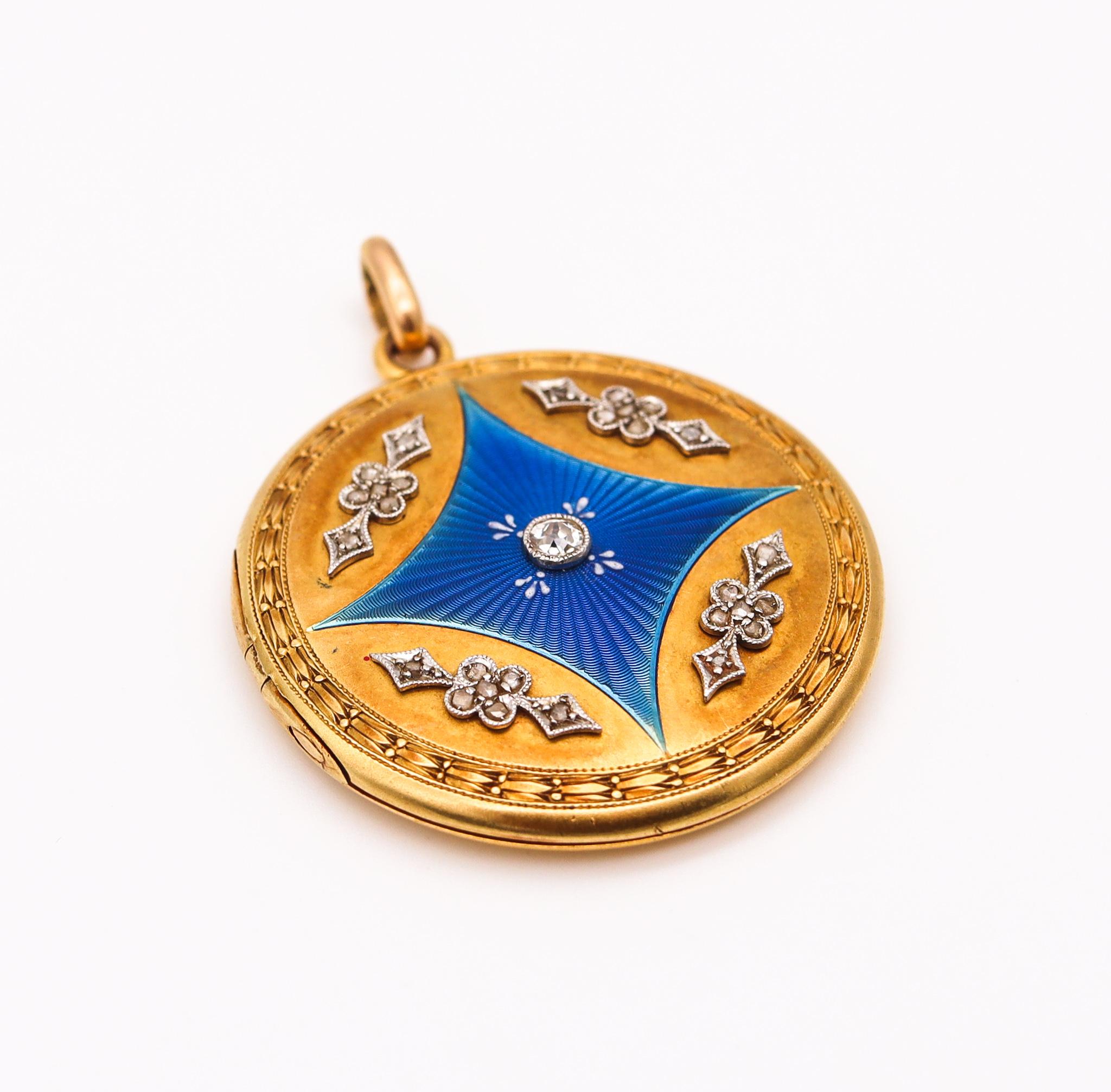German locket pendant from the Edwardian period.

Fabulous round locket pendant, created during the Edwardian period in Germany back in the 1900. This beautiful colorful piece has been crafted in solid yellow gold of 18 karats with accents in