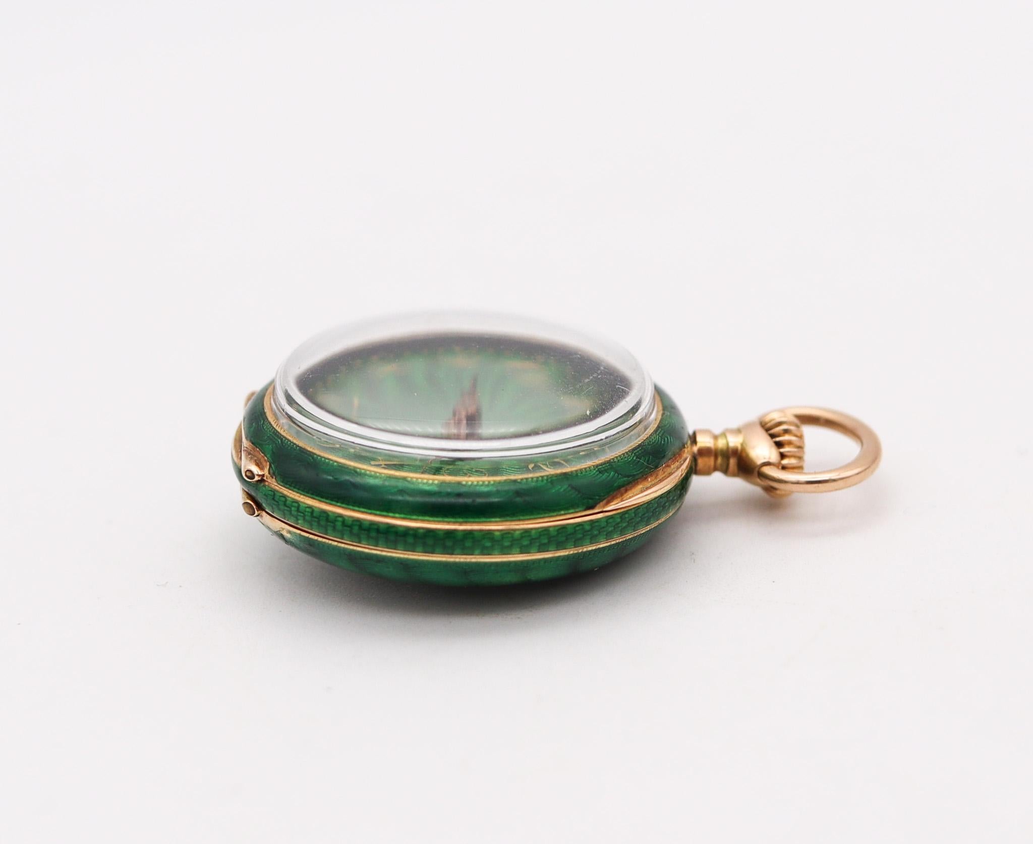 Edwardian Swiss pocket watch pendant in guilloche,

Gorgeous open face pocket watch, created in Switzerland during the Edwardian period, back in the 1905. Crafted in solid yellow gold of 14 karats end embellished with a vivid green hot enamel over a