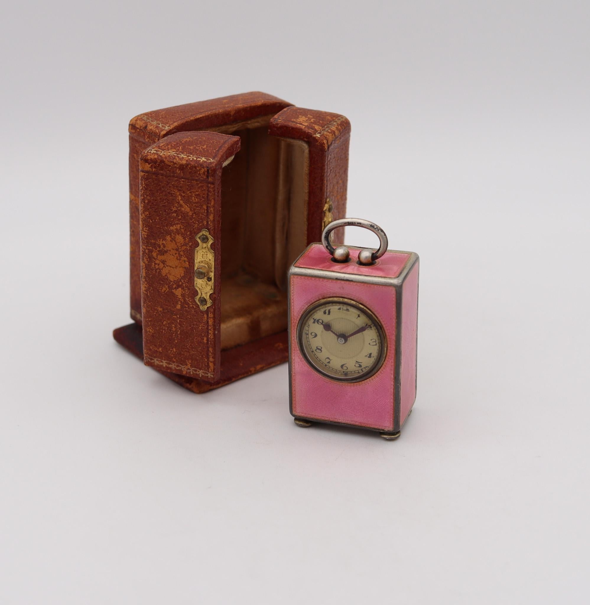 An Edwardian miniature travel clock designed by Valmé.

Extremely beautiful antique miniature travel-carriage clock, made in Geneva Switzerland by the Concord Watch Co. This little antique clock is exceptional, created during the Edwardian and the
