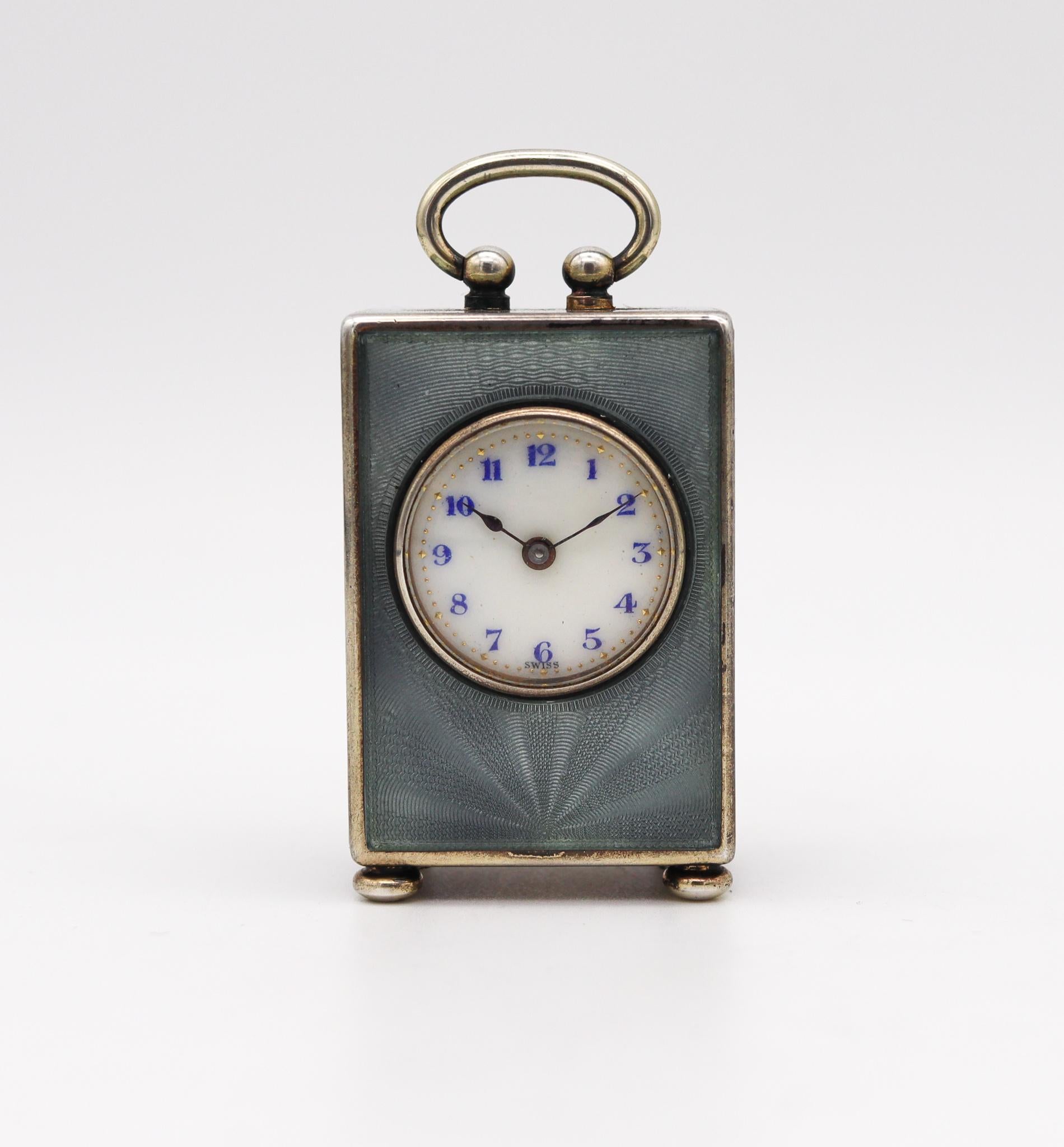 An Edwardian miniature travel clock designed by Valmé.

Stunning and rare miniature travel-carriage clock, made in Geneva Switzerland by the Valmé Swiss Co. and the Concord Watch Co. This little antique clock is exceptional, created during the