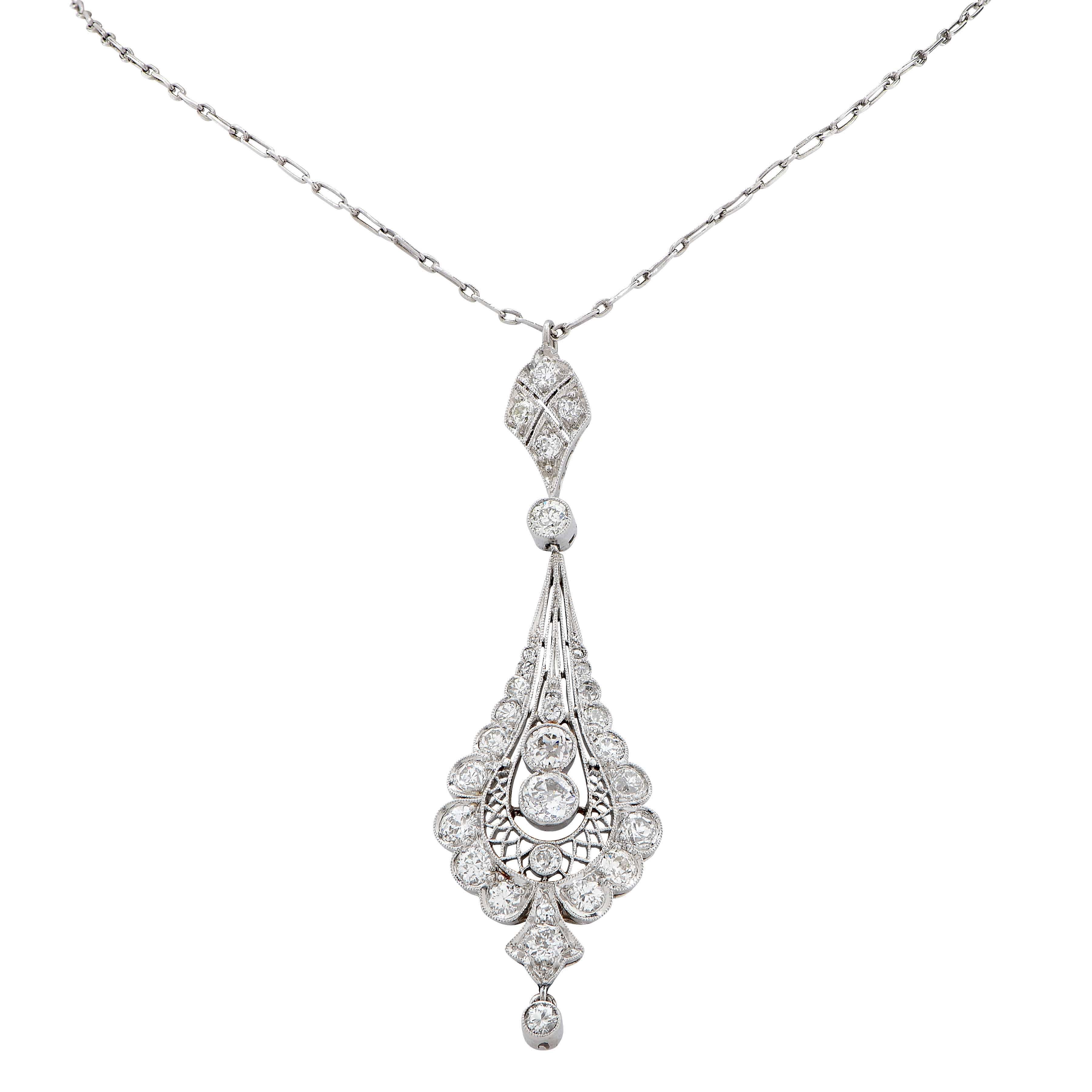 Edwardian Platinum and Diamond Pendant Necklace features 28 old European cut diamonds H/I Color, Si Clarity with and estimated total weight of 2 carats mounted on a platinum chain. Pendant is circa 1910
Chain Length: 16 Inces
Metal Type: