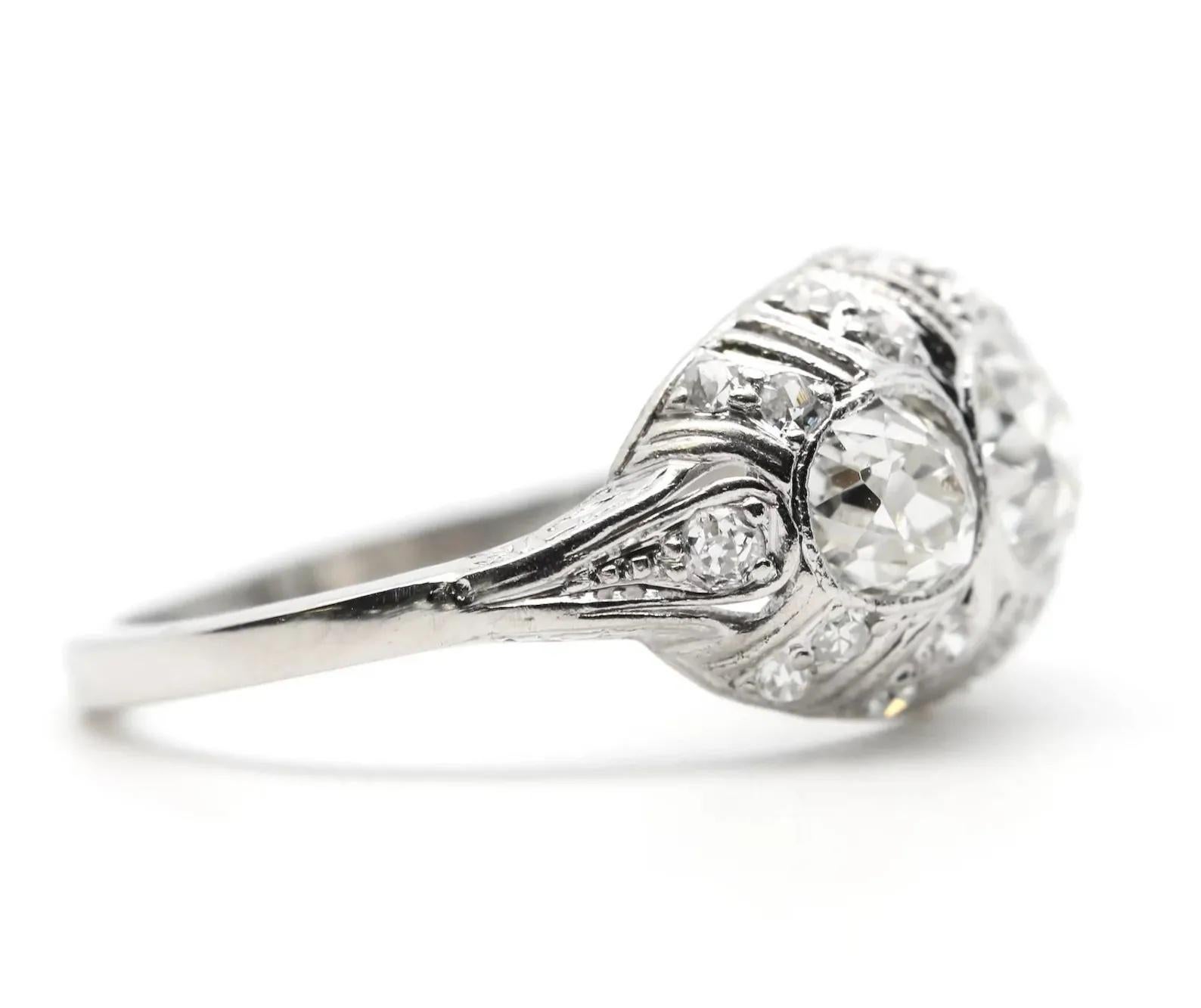 Edwardian 2.06 Ctw Old Mine Cut Diamond Three Stone Ring in Platinum In Good Condition For Sale In Boston, MA