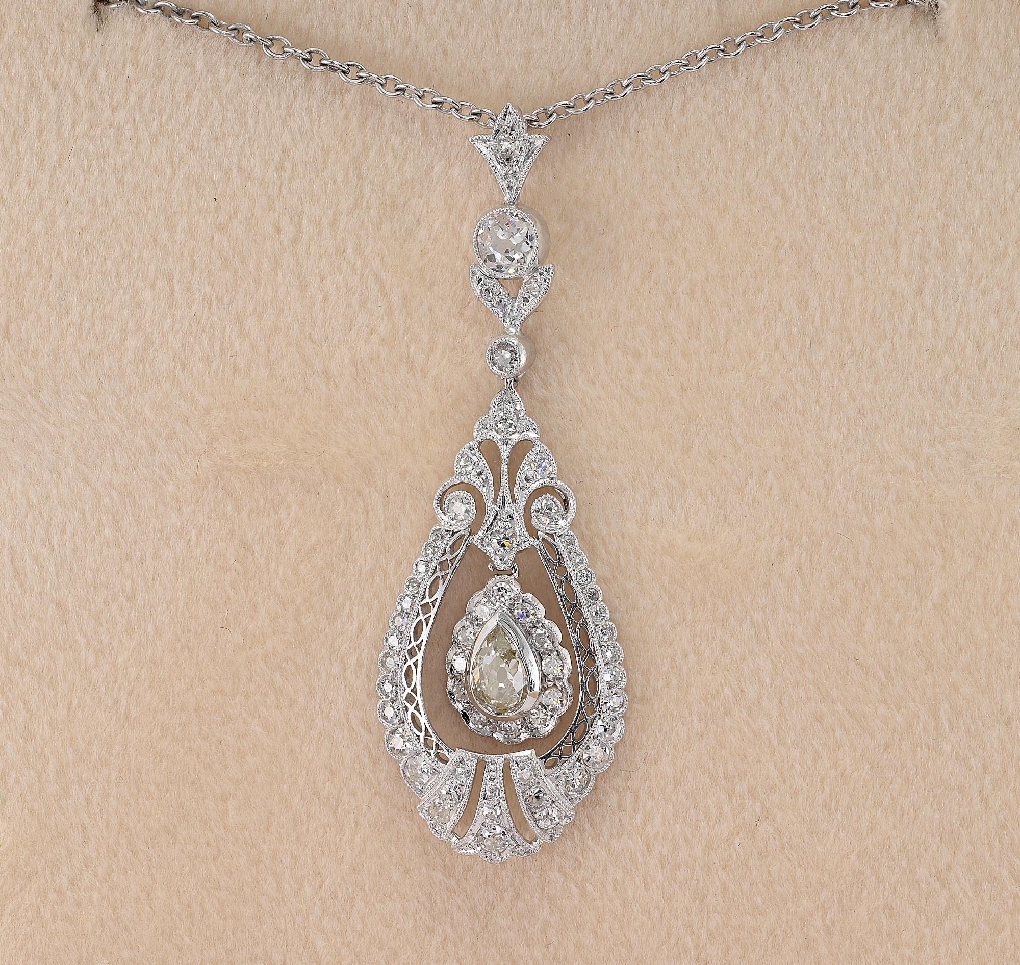 This very charming antique Edwardian period Diamond pendant is 1905 circa
Skillfully hand crafted during the time of solid 18 KT white gold
Amazing openwork design, detailed with scrolls and fretwork making it quite a one off
Diamond set has two
