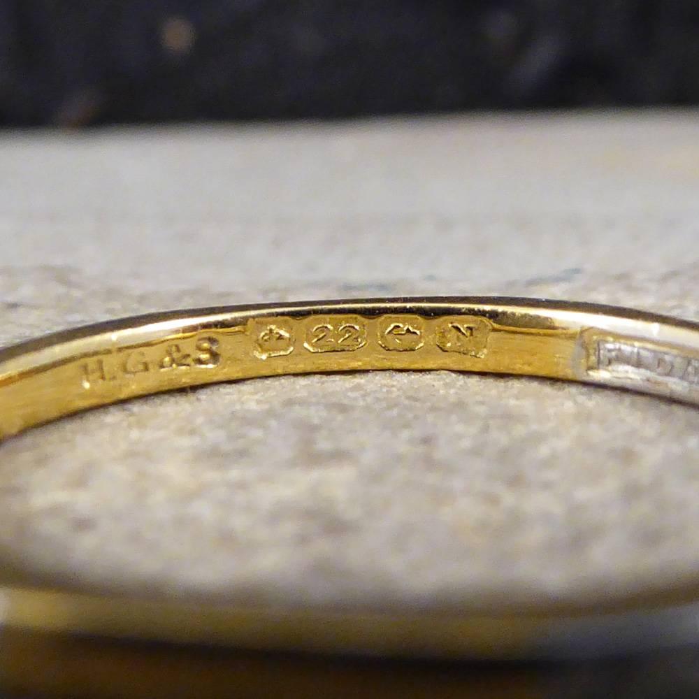 Sometimes a thin wedding band is all that is needed and exactly what you are looking for, so dainty and unique. This gorgeous Edwardian Wedding Band has been crafted from 22ct Yellow Gold with 6 small Platinum panels with a pattern engraving on