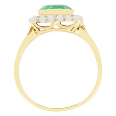 Edwardian 2.20ct Emerald and Diamond Cluster Ring, c.1910s