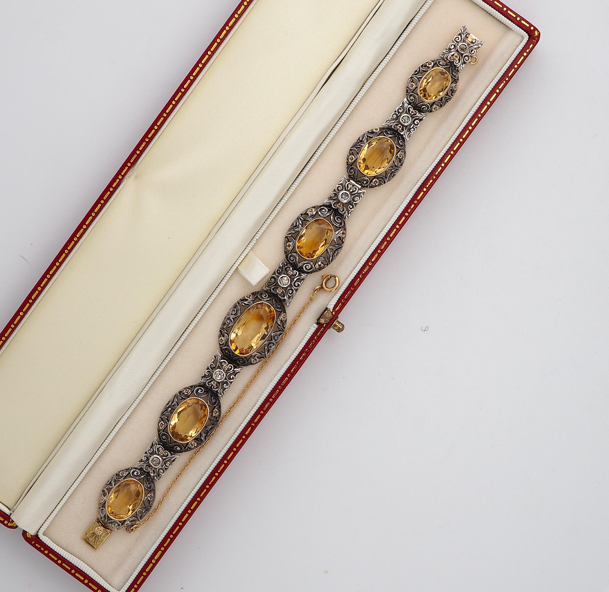 This breathtaking antique Edwardian period bracelet is 1910 circa
Magnificent workmanship expressed in rich scroll, flower and leaf openwork exquisitely made of silver and 18 KT gold, comprising six oval panels slightly graduated connected each