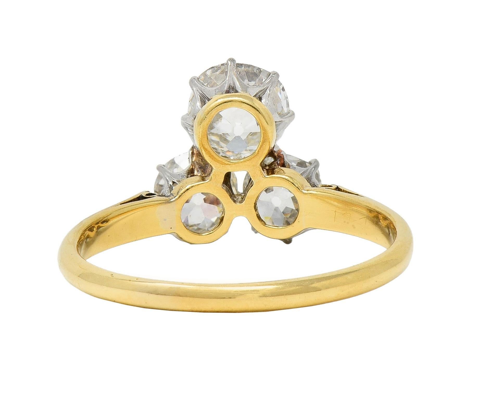 Edwardian 2.55 CTW Mine Diamond Platinum 18 Karat Gold Antique Three Stone Ring In condizioni ottime in vendita a Philadelphia, PA