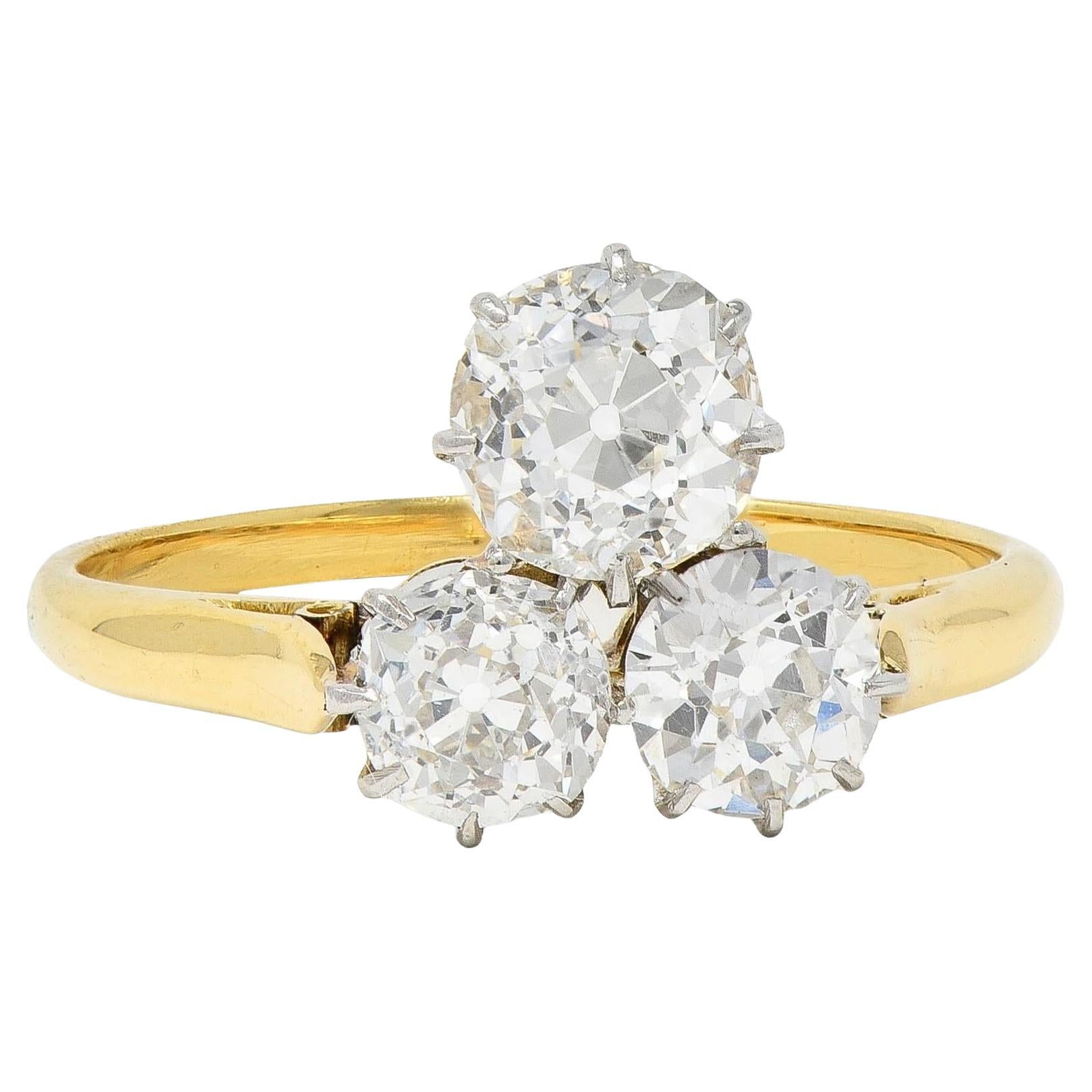 Edwardian 2.55 CTW Mine Diamond Platinum 18 Karat Gold Antique Three Stone Ring
