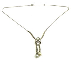 Edwardian 2.6 Carat Diamond and Natural Pearl Lavalier Necklace, circa 1910