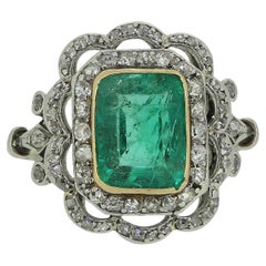 Edwardian 2.60 Carat Colombian Emerald and Diamond Cluster Ring