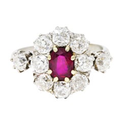 Edwardian 2.70 Carats Ruby Old Mine Diamond 18 Karat Two-Tone Gold Cluster Ring