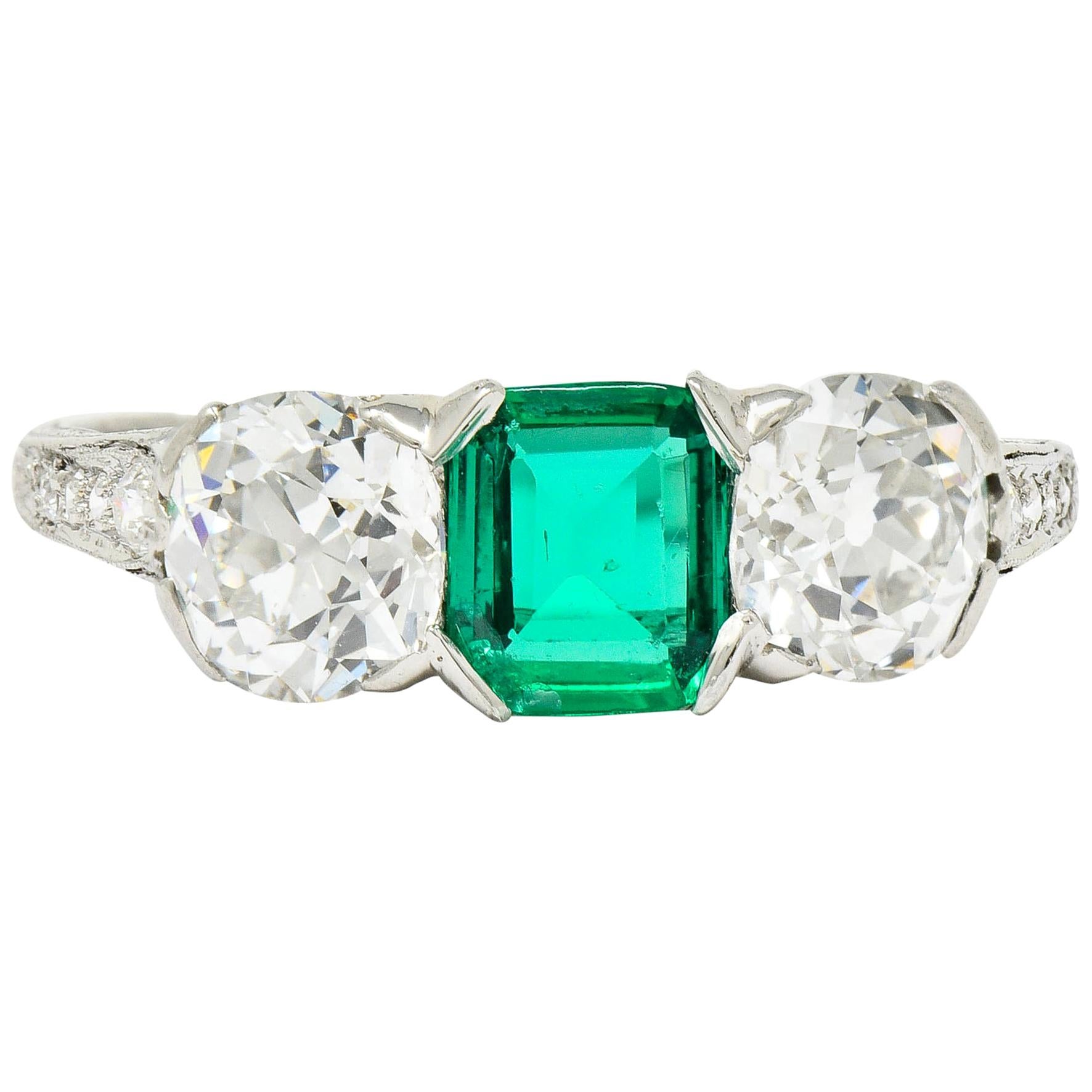 Edwardian 2.71 Carat Emerald Diamond Platinum Three-Stone Ring, circa 1915