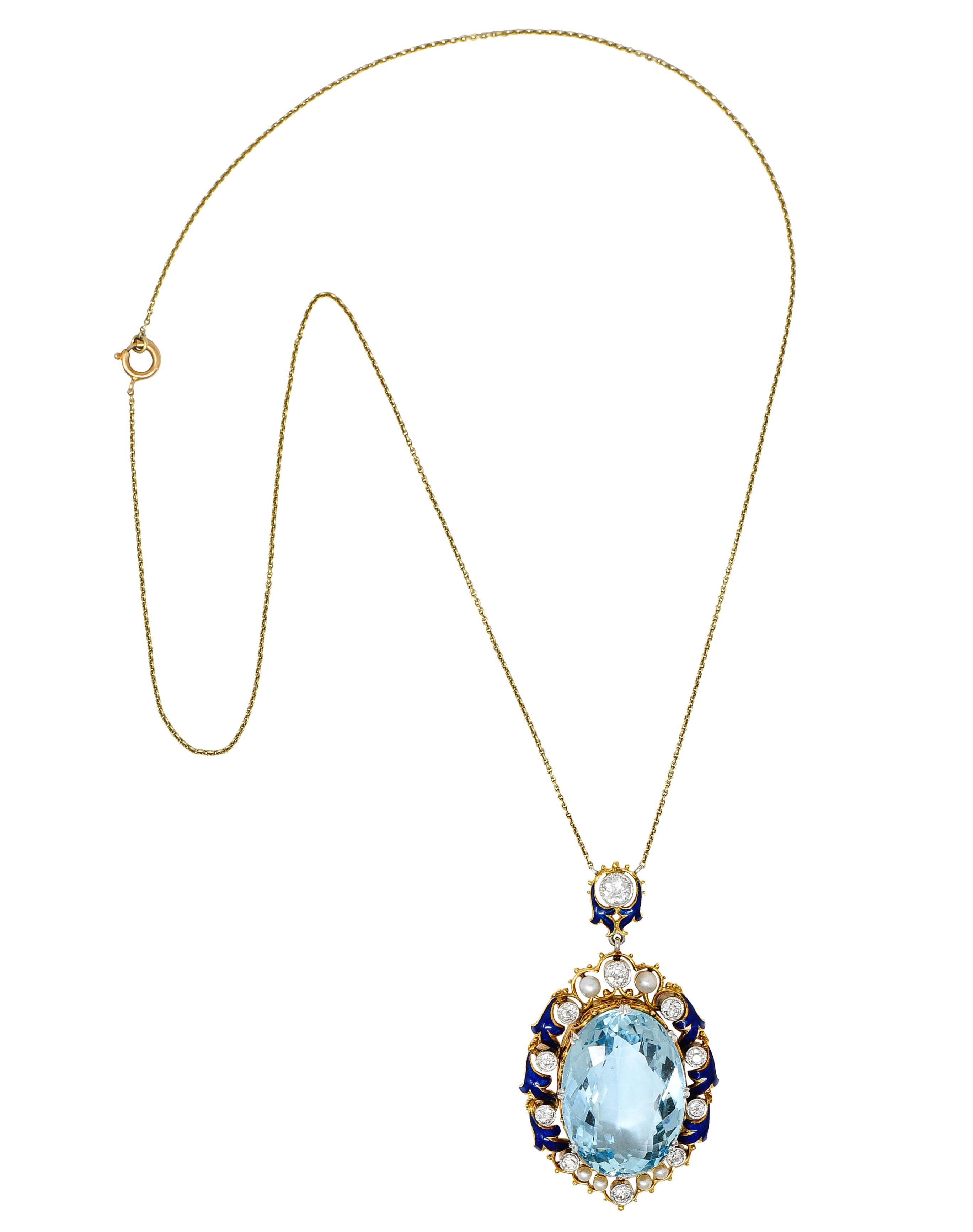 Designed as a cable chain necklace centering a pierced scrolling foliate gemstone station
Centering an oval cut aquamarine measuring 25.0 x 17.5 mm - transparent light blue in color weighing approximately 26.71 carats
Set with platinum-topped split