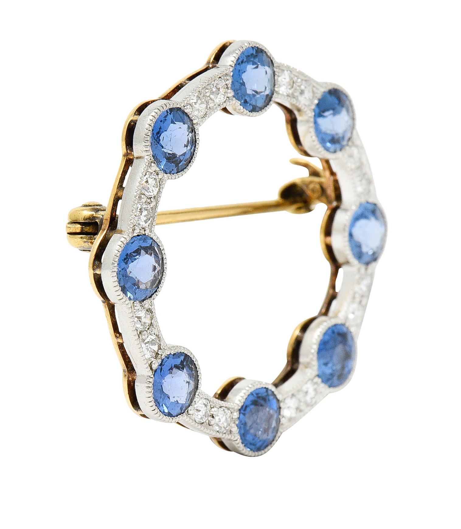 Circular brooch features eight sapphires weighing in total approximately 2.40 carats

Round cut and very well matched with violetish blue color

With transitional cut diamonds weighing in total approximately 0.35 carat - G to I color with SI