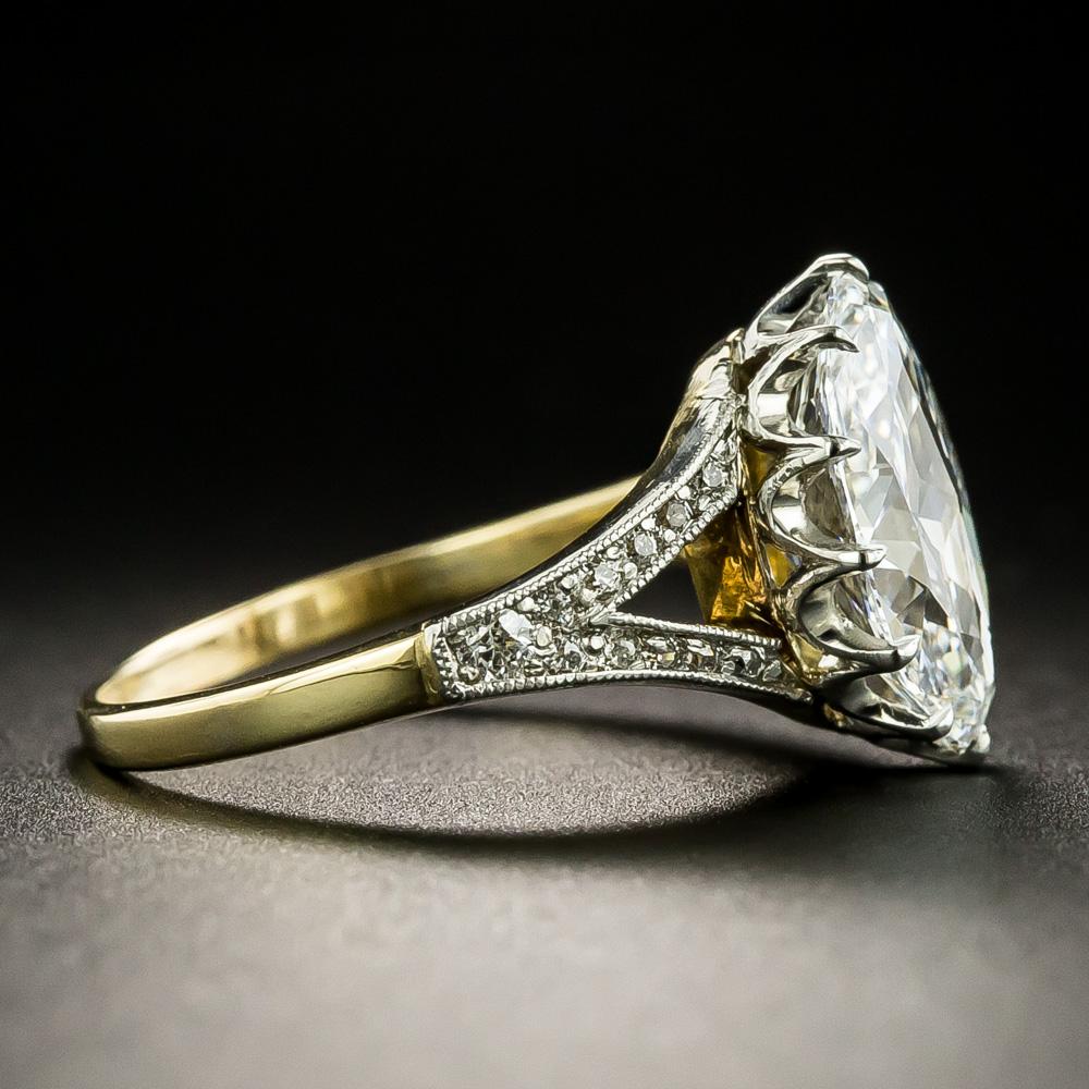 Unique and fabulous! (to say the least), this magnificent, one-of-a-kind, original Edwardian-era dazzler presents a diamond the likes of which we've NEVER seen before! Half oval/half marquise (hence 'Moval'), this extraordinary icy-white sizzler,