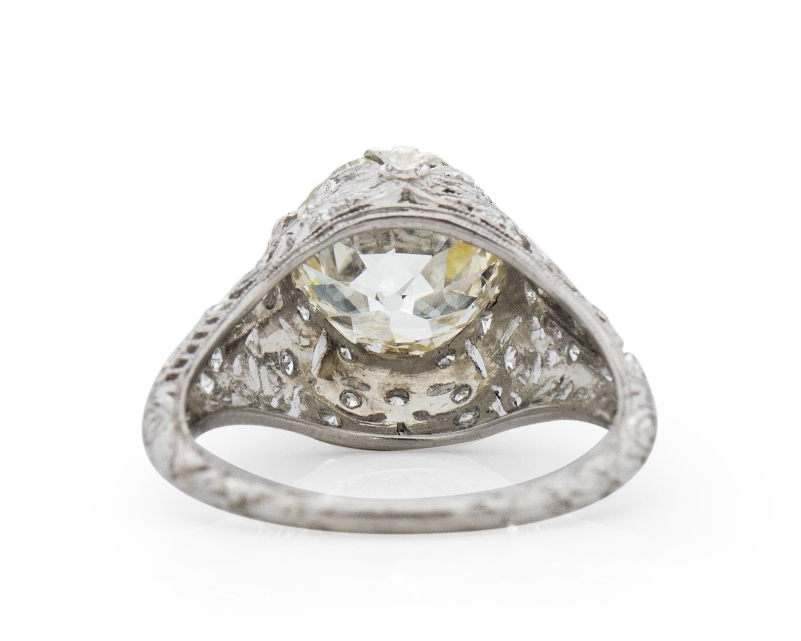 Round Cut Edwardian 2.89 Carat GIA Diamond Platinum Engagement Ring with Carved Bow Motif