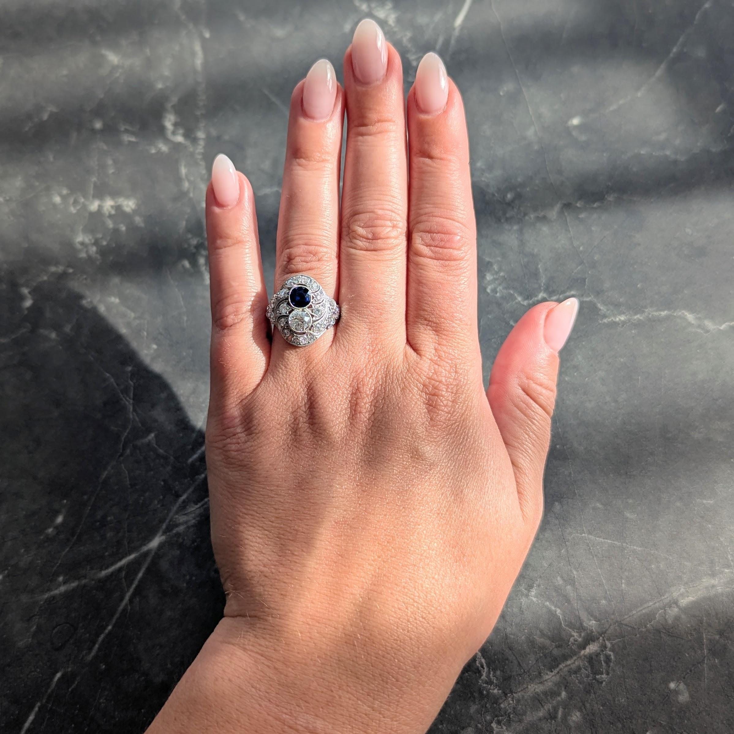 Centering a cushion cut sapphire and and old European cut diamond bezel set toi-et-moi style
Sapphire weighs approximately 0.89 carat total - transparent medium blue in color
Old European cut diamond weighs approximately 0.68 carat total
I color