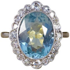 Edwardian 3 Carat Aquamarine, Diamond, Gold and Platinum Cluster Engagement Ring