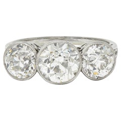 Edwardian 3.10 CTW Old Mine Cut Diamond Platinum Antique Three Stone Ring