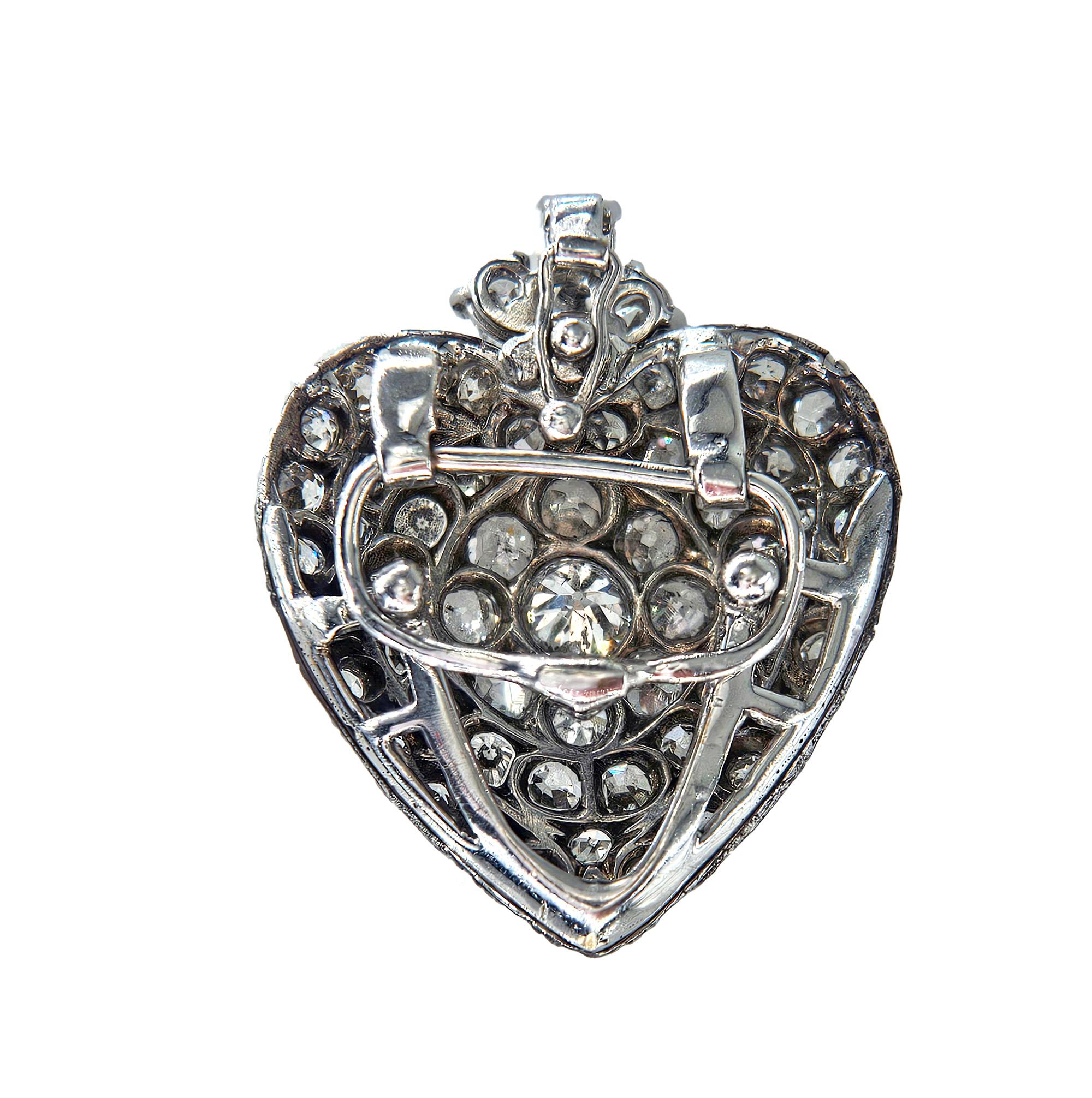 Exquisite Edwardian 3.70ctw Old European, Old Mine & Pear Shaped DIAMOND Pavé Heart PLATINUM Pendant Enhancer Locket Necklace.
Discover a captivating piece of history with this exceptional Edwardian diamond heart, a true masterpiece of early