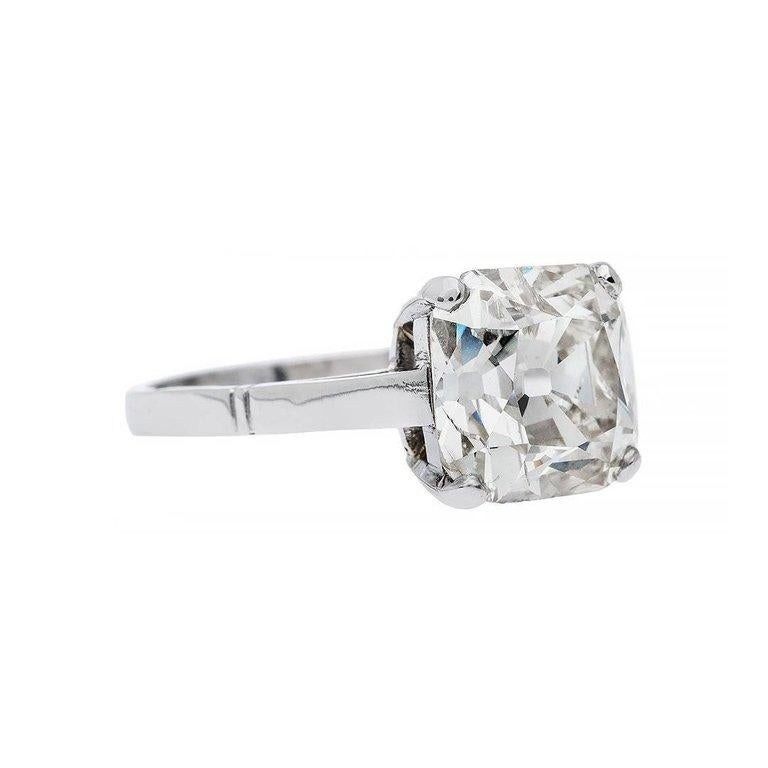 A mesmerizing old mine cut diamond that allows you to look deep within the stone to appreciate all its beauty inside and out. A classic solitaire engagement ring featuring a 3.98 carat old mine cut diamond. Hand crafted in platinum.  

Ring size 7