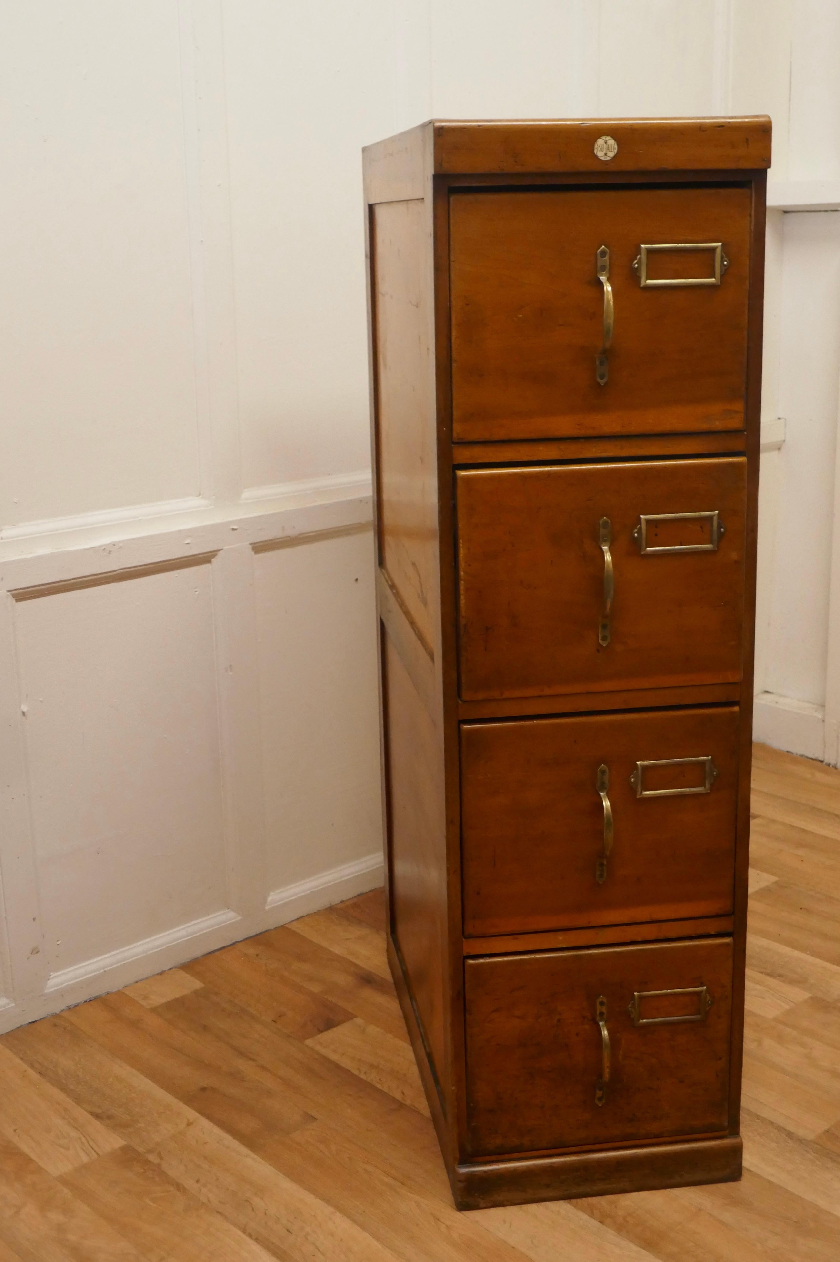 Edwardian 4 Drawer Golden Oak Filing Cabinet, by SU-TALL

This is an absolute must for every home office or study, the cabinet has 4 deep and roomy drawers, they all glide smoothly and have brass handles and card holders on the front

The Filing