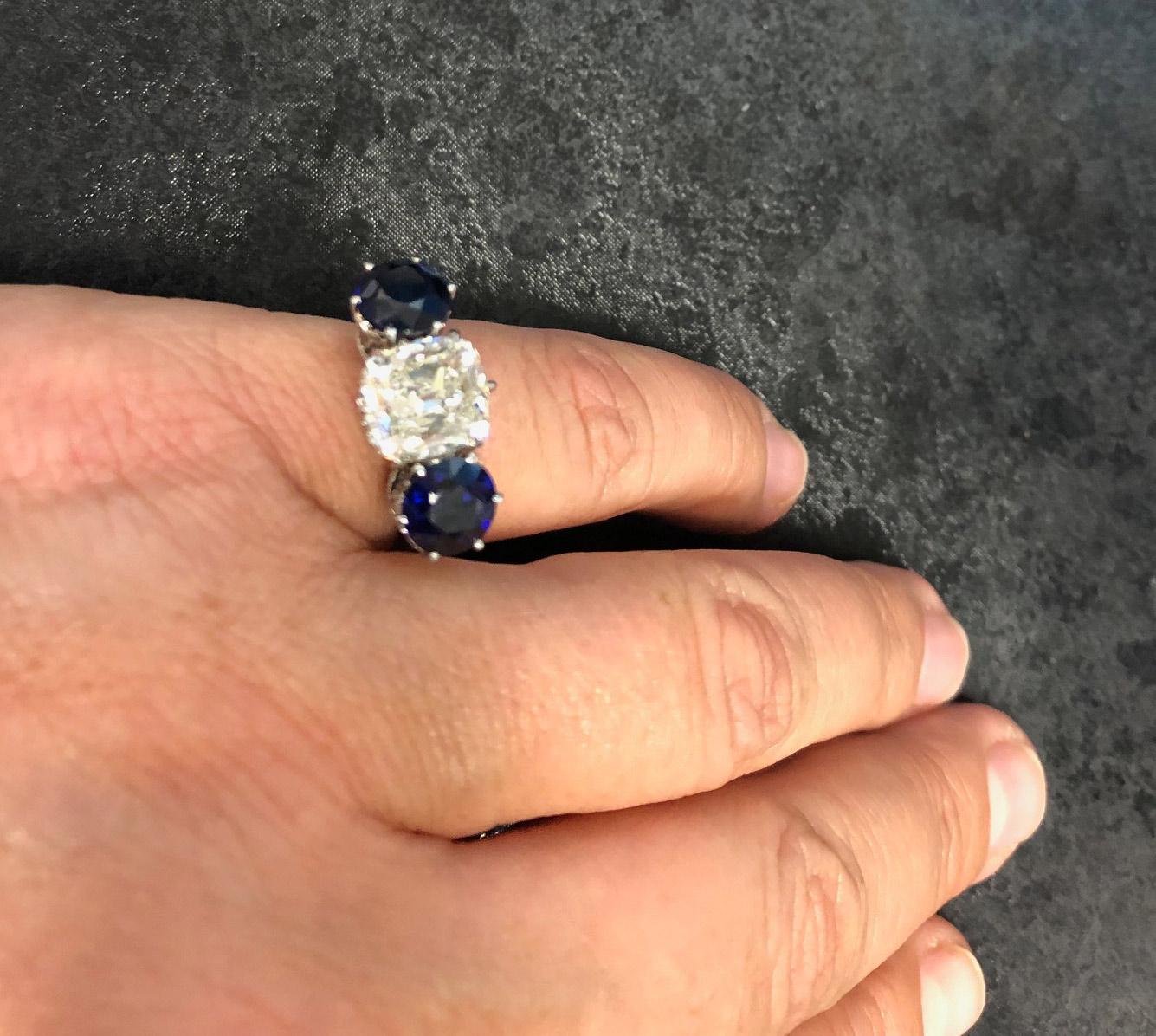 Edwardian 4.04 Carat Cushion GIA Certified Diamond Sapphire 3 Stone Ring In Excellent Condition In New York, NY