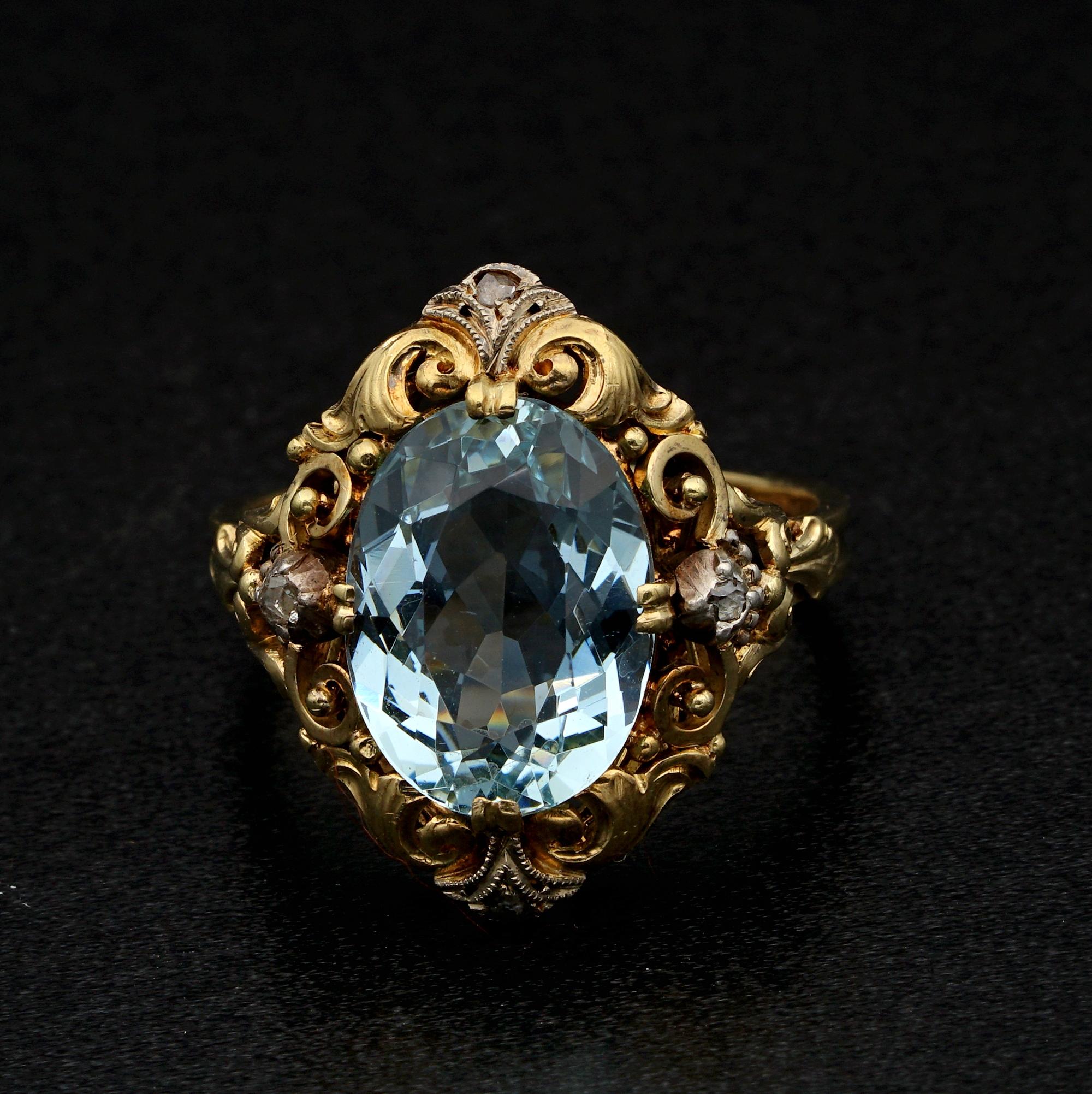 Framed Sky
This authentic Edwardian ring is epitome of elegance
Exquisitely hand crafted mounting with gorgeous motifs in vogue at the time make the frame to the fantastic Aquamarine known to be totally Natural untreated 4.70 CT oval faceted