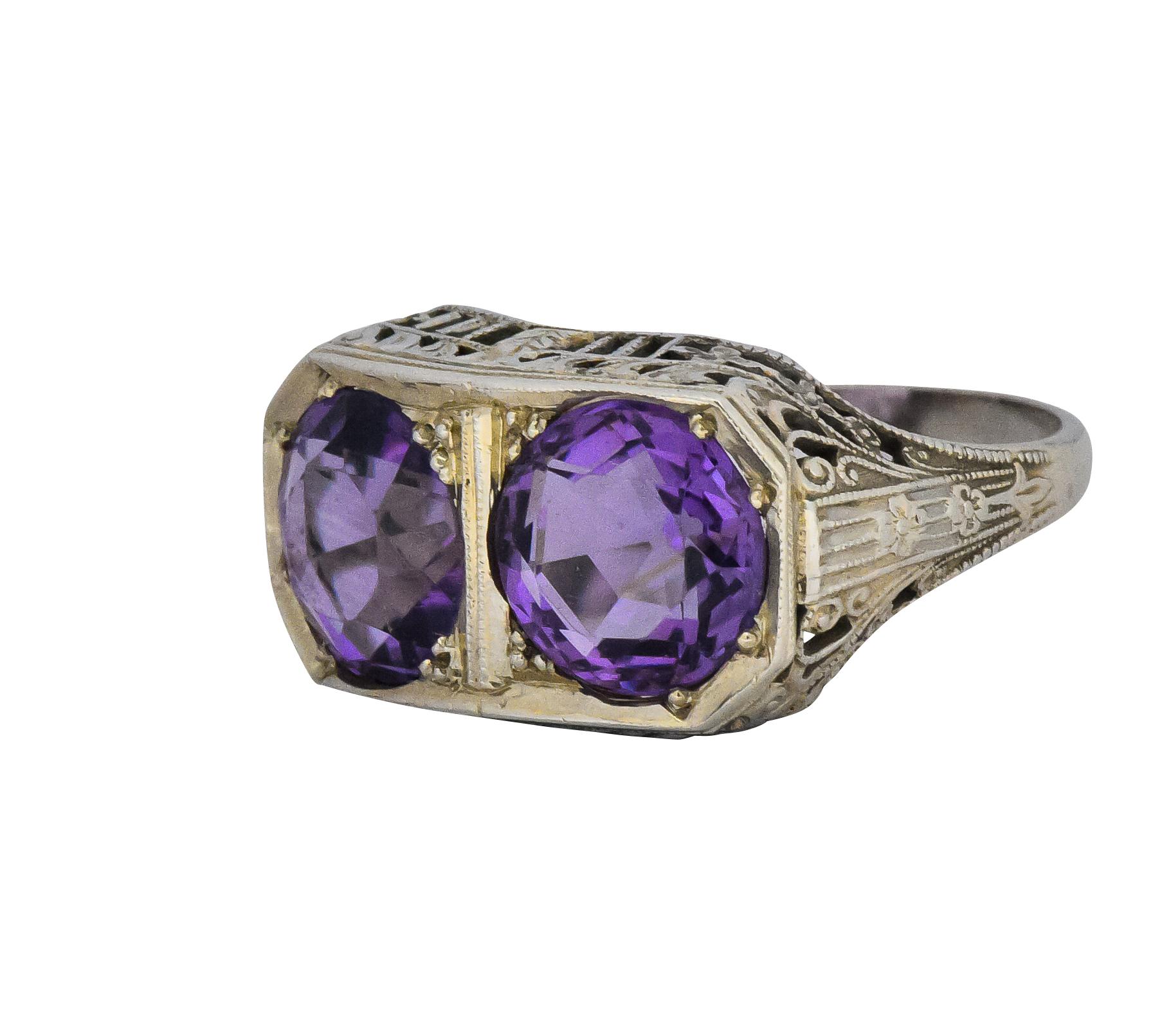 Featuring 2 old European cut amethysts, weighing approximately 4.80 carats total, bright purple and very well matched

Pierced gallery with foliate motif

Tested as 14 karat white gold

Ring Size: 8 1/4 & Sizable 

Top measures 11.7 mm and sits 5.2