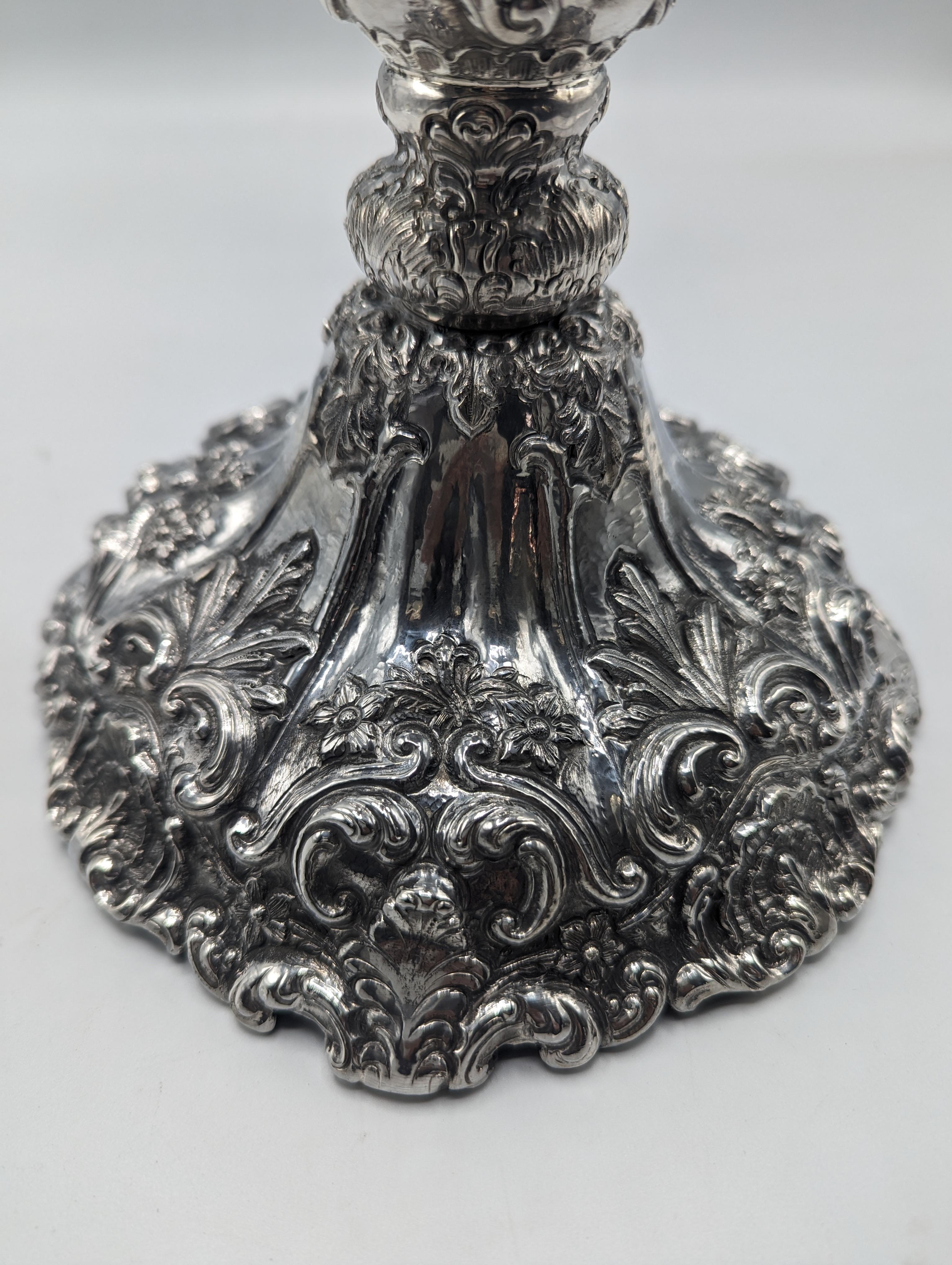 Handcrafted Sterling Silver Candelabra. Each part has been thoroughly embossed with the same tools used for hundreds of years by Bolivian silversmiths. This is a form of art that may come to disappear in time. In an age of mass production, handmade