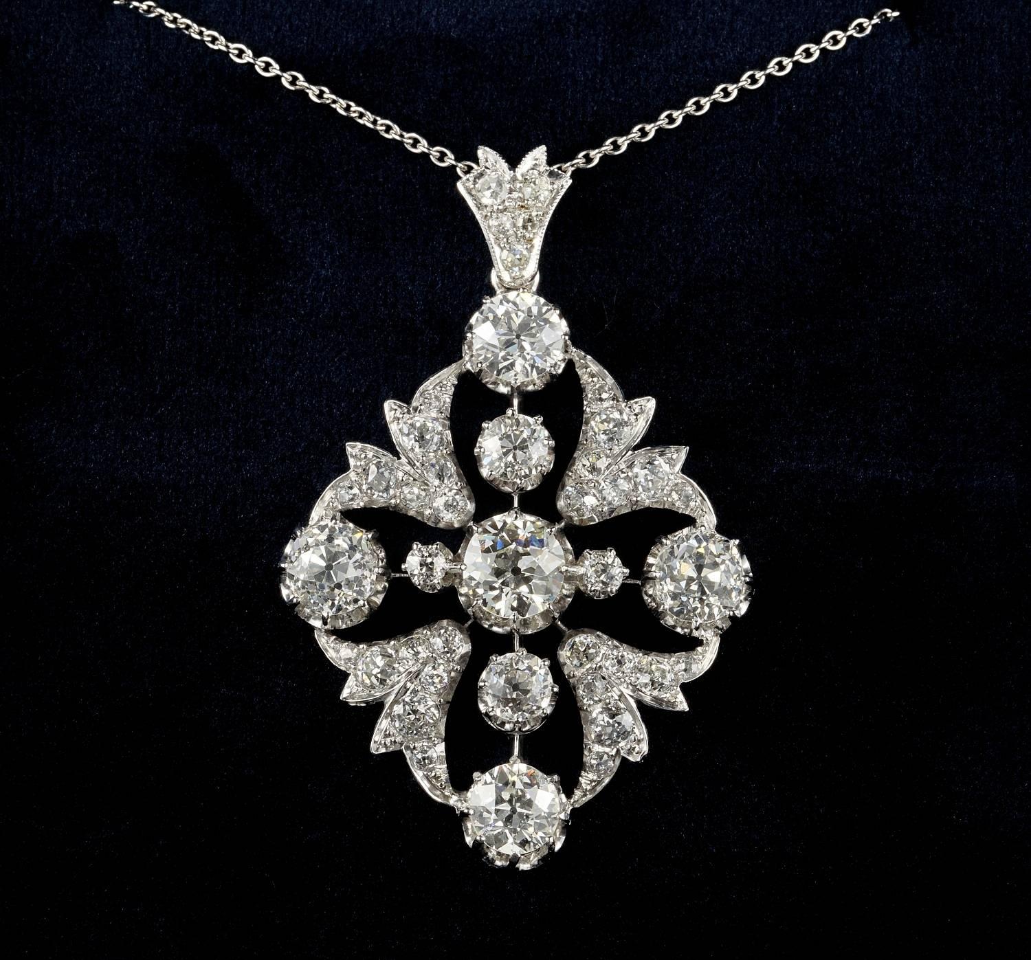 An impressive authentic Edwardian large sized Diamond pendant
The striking naturalistic design is literally overwhelmed by large sized old mine cut Diamonds
Superbly hand crafted of solid Platinum with 18 Kt accent of work at the back side -tested.